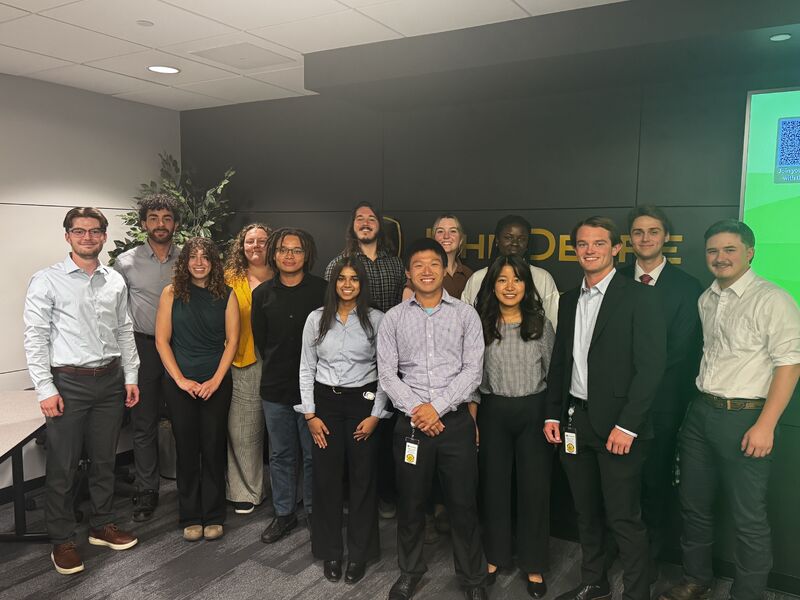 Suvu with her John Deere colleagues